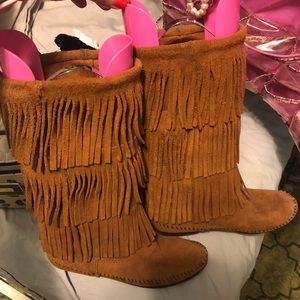 Minnetonka fringe brown boots.